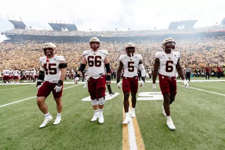 BC captains head to midfield at Missouri.