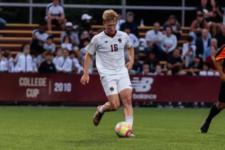 Marci Killeen with the ball in midfield against Siena