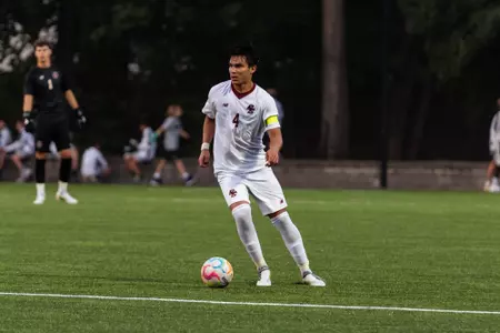 Diego Ochoa looking to make a pass against Siena