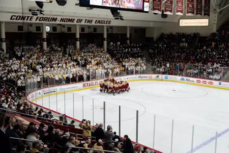 Men's Hockey huddle during BU game