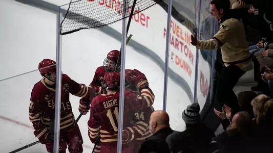 Men's Hockey celebrates goal against Providence