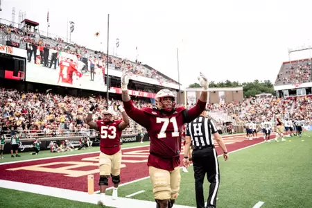 Jude Bowry and Dwayne Allick celebrate a touchdown vs. Duquesne.