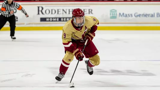 Ryan Leonard skating with the puck against BU