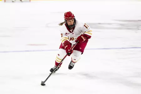 Olivia Maffeo with puck vs Holy Cross