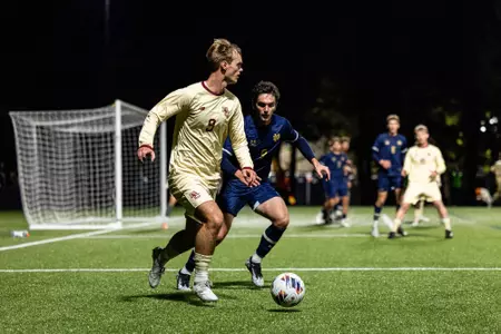 Nikolai Rojel with the ball against Notre Dame