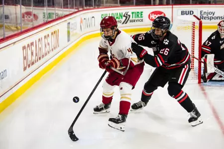 Teddy Stiga fighting for the puck