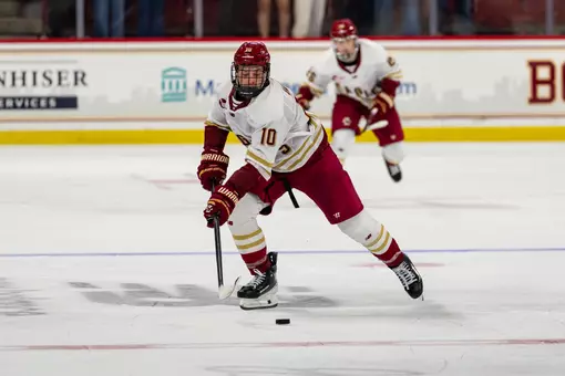 James Hagens skating with the puck against Quinnipiac