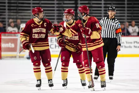 Men's Hockey celebrates Paul Davey goal against UMass