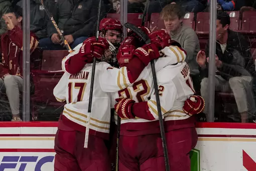 Men's Hockey celebrating goal in win over Maine