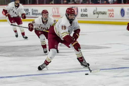 Dean Letourneau skating with the puck against Maine