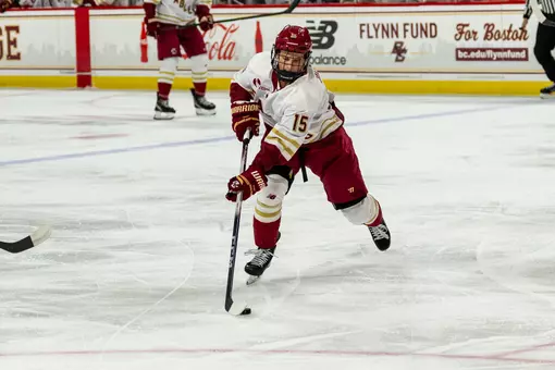 Oskar Jellvik skating with the puck against Northeastern