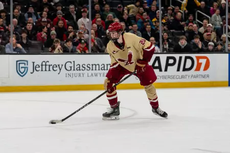 Dean Letourneau holds the puck vs. BU in the Beanpot Championship at TD Garden.