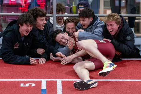 Pat Mulryan celebrating his Mile time at BU