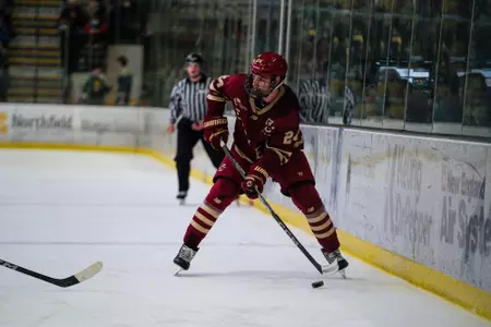 Andre Gasseau skating with the puck against UVM