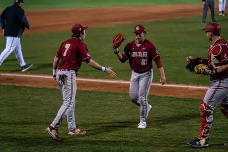 Tyler Mudd walks off the field