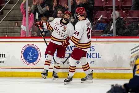 Stiga and Gasseau celebrating goal against Merrimack
