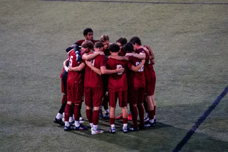 MSoc huddle before Providence game