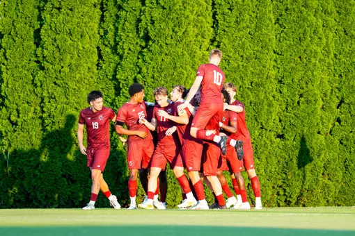 Men's Soccer celebrates penalty kick goal against Virginia Tech