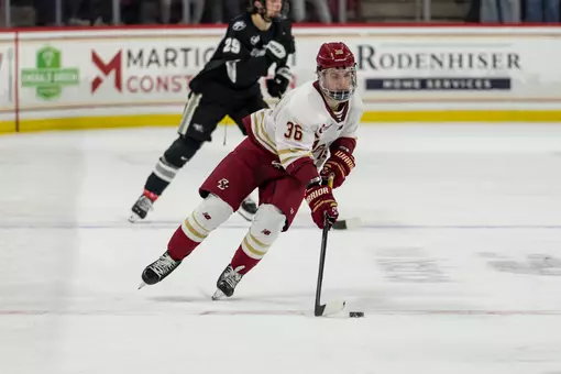 Ryan Conmy skating with puck against Providence