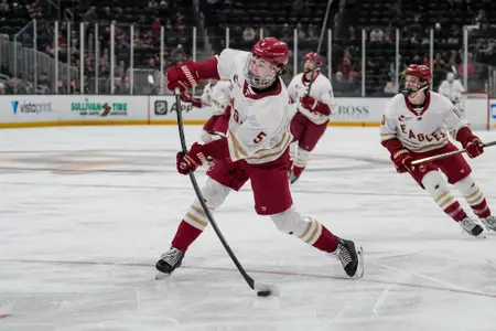 Drew Fortescue shooting the puck