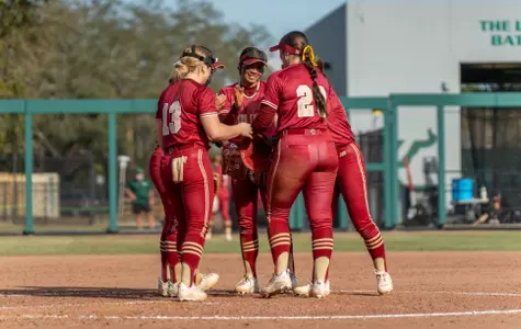 Softball in a huddle
