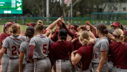 Softball Huddle against Indiana
