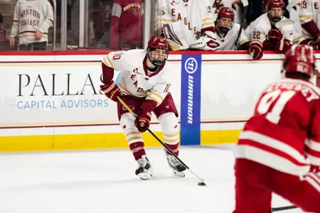 James Hagens with the puck.
