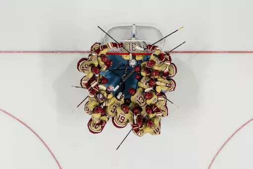 Over the goal team huddle