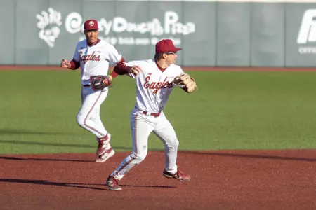 Luke Gallo throwing the ball to second base against Maine