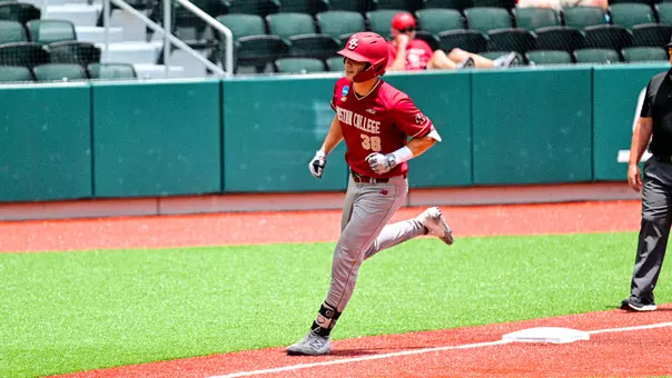 Jack Toomey rounds third base after hitting a home run
