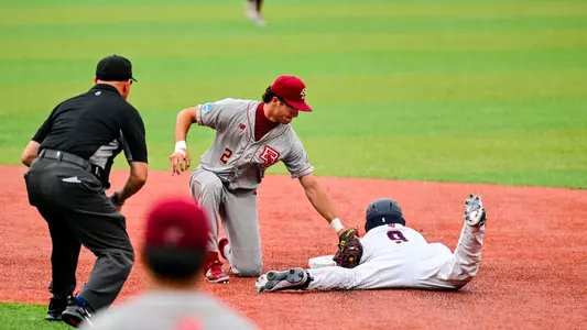 Ty Mainolfi makes the tag at second base against Liberty in the NCAA Athens Regional Second Round Elimination Game