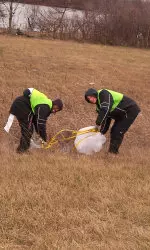 Soccer Clean-up Turns Highway Orange and Brown Image