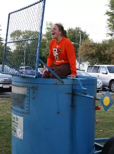 Tracy Pontius in dunk tank at golf outing