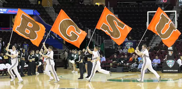 Cheerleader dudes at the Q - B G S U BGSU flags