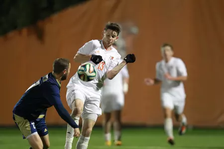 Danny Shea blocks an Akron shot - Ruben Kappler photo - Oct 11 2014