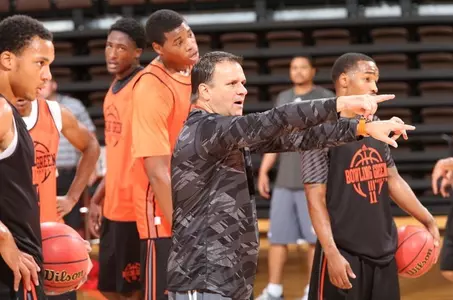 Coach Jans coaching at practice