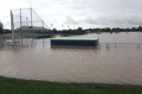 softball field flooded rain out cancelled postponed rain delay inclement