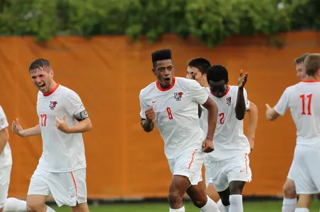 Max Auden, Alexis Souahy, Bismark Agyeman celebrate a goal v SIUE