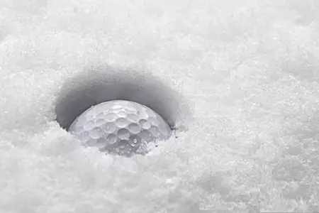 golf ball in snow