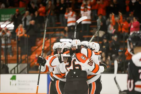 Falcons hug after core vs RMU