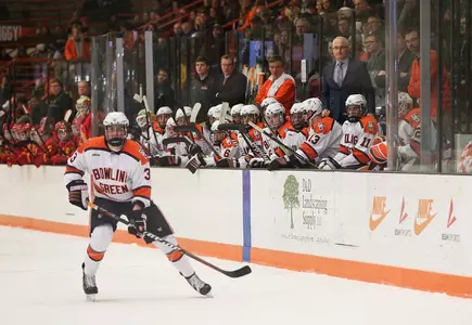 Carson Musser in front of the bench