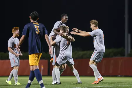 Ike Swiger is congratulated after his goal vs Canisius