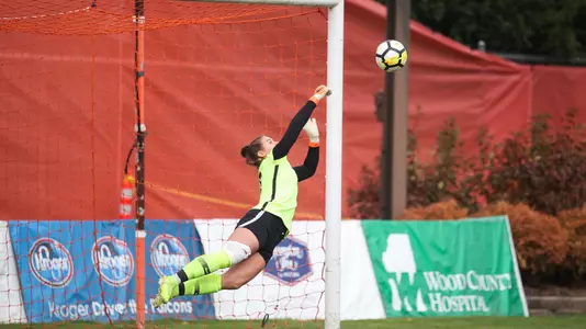 Kathleen Duwve saves a penalty kick during the PK phase of the MAC Tournament championship match