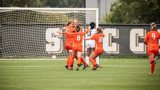 Falcons congratulate Kennedy White on her first-half goal at WMU