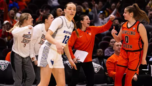 Falcons celebrate a Morgan Sharps 3-pointer v Buffalo - March 13, 2024