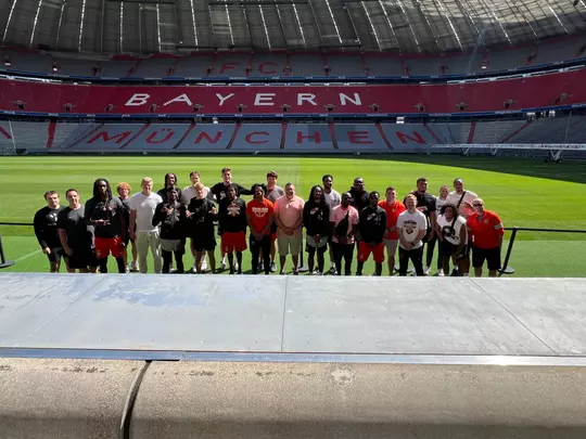 Team Photo in front of the pitch