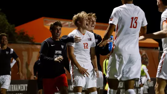 The Falcons celebrate Bennett Painter's (12) second-half goal