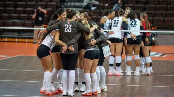 Team Huddles vs Arkansas State at the Stroh Center
