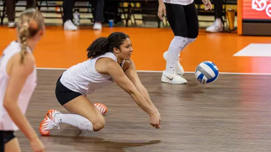 Avery Hobson Digs a ball against Miami in the Stroh Center