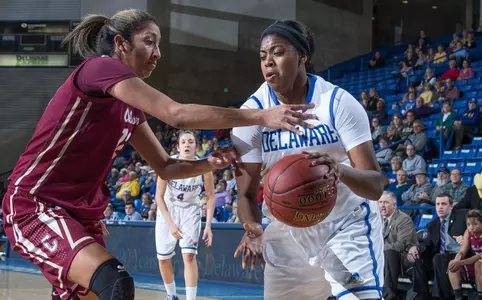 Hens Cruise to 80-49 Win Over Cougars